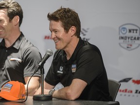 Simon Pagenaud (left) and defending Honda Indy Toronto champion Scott Dixon laugh during Thursday’s news conference. (Andrew Lahodynskyj/The Canadian Press)