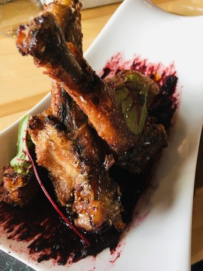 Sky Bistro Chef Scott Hergott’s renowned duck wings. (Kevin Hann)