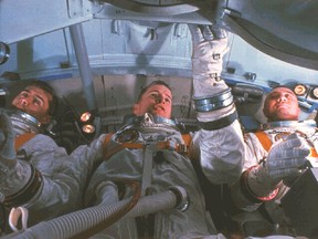 Astronauts Chaffee, Grissom and White inside the Apollo command module simulator