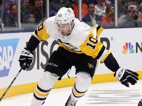 Garrett Wilson #10 of the Pittsburgh Penguins skates against the New York islanders in Game One of the Eastern Conference First Round during the 2019 NHL Stanley Cup Playoffs at NYCB Live's Nassau Coliseum on April 10, 2019 in Uniondale, New York. (Photo by Bruce Bennett/Getty Images)