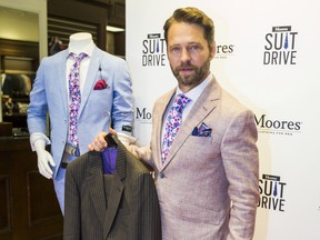 Canadian actor and director Jason Priestley donates a suit to the 10th Annual Moores Suit Drive at the retailer's flagship store on Yonge St. in downtown Toronto on Tuesday, July 9, 2019. Ernest Doroszuk/Postmedia Network