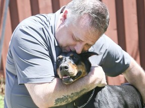 Sandro Ferrari, owner of Brace Yourself Orthopadics, with one of his favourite patients.