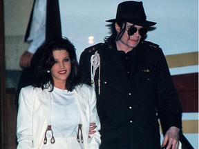 This Aug. 16, 1994, file photo shows Michael Jackson and his then wife Lisa-Marie Presley arriving at the airport in Budapest.