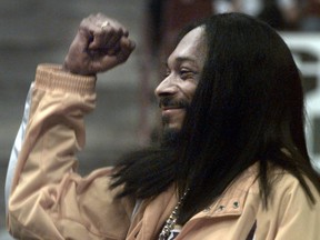 Rap star and ardent L.A. Lakers fan Snoop Dogg enjoys a Grizzlies vs. Lakers game at GM Place in Vancouver. (Peter Battistoni/Postmedia archives)