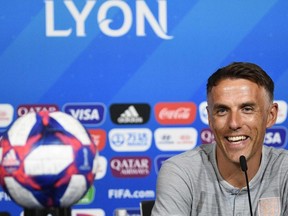 England's head coach Phil Neville reacts during a press conference at the Groupama stadium in Lyon, on June 30, 2019, during the France 2019 Women's World Cup. USA will face England during the France 2019 Women's World Cup semi-final football match on July 2, 2019.