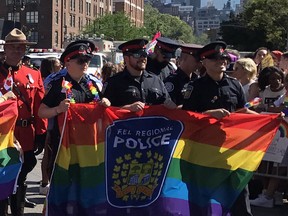 Peel Region Police and an RCMP officer in uniform participated in the NYC Pride March on June 30, 2019. (Twitter/@TDotGayCop)