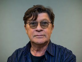 The Band's guitarist-singer-songwriter Robbie Robertson poses for a photo at the office of Penguin Random House in Toronto on Tuesday Nov. 22, 2016. (Ernest Doroszuk/Postmedia Network)