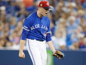 Aaron Sanchez of the Toronto Blue Jays reacts against the Baltimore Orioles after getting out of the first inning during their MLB game at the Rogers Centre on July 5, 2019 in Toronto.