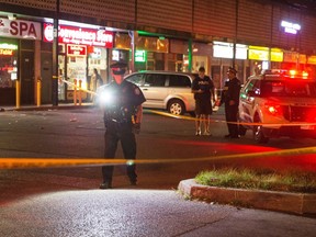 Police search for evidence after a shooting in Rexdale that left a man with life-threatening injuries