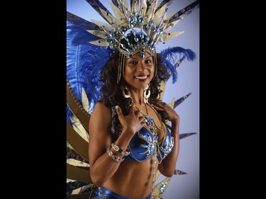 SUNshine Girl Raesha is ready for the Toronto Caribbean Carnival week, playing at Pan Alive and being one of the parade hosts on CP24. She on the parade route she will be with the EPIC Carnival mas camp wearing her brilliant gold and blue costume called The Ruler. Our 5-foot-8 parader is a dental hygienist, loves the Raptors and Leafs and is very athletic. She is cool mom who likes riding her Kawasaki Ninja . Jack Boland/Toronto Sun/Postmedia Network