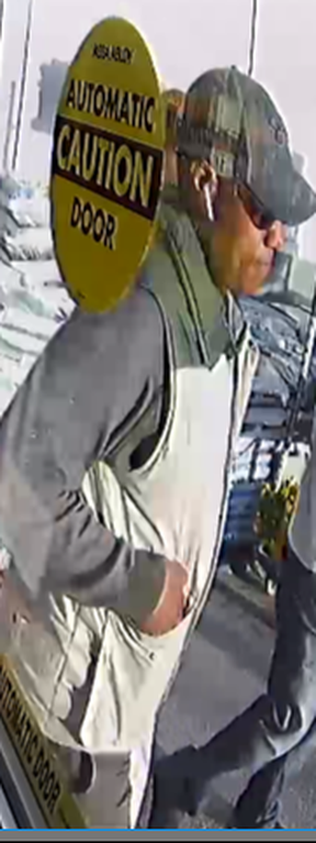 An image released by Halton police of a suspect in an alleged credit-card fraud scheme targeting a Milton condo building.