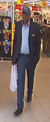 An image released by Halton police of a suspect in an alleged credit-card fraud scheme targeting a Milton condo building.