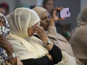 Somali mothers and family members of young men who have died violently by gunfire on Toronto's streets at the Toronto Police Services Board meeting on Wednesday July 31, 2019.