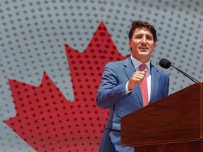 Prime Minister Justin Trudeau speaks during Canada Day festivities on Parliament Hill in Ottawa, July 1, 2019. (REUTERS/Patrick Doyle)