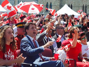 Prime Minister Justin Trudeau cheers during Canada Day festivities on Parliament Hill in Ottawa, July 1, 2019.