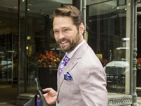 Canadian actor and director Jason Priestley, donates a suit to the 10th Annual Moores Suit Drive at the retailer’s flagship store on Yonge St. in downtown Toronto, Ont. on Tuesday July 9, 2019. Ernest Doroszuk/Toronto Sun/Postmedia