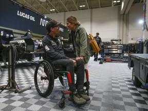 IndyCar driver Robbie Wickens, of Guelph, in the Arrow team paddock with his fiancé Karli. Wickens talked about his recovery process after a horrific crash at the Supply 500 race at the Pocono Speedway in August 2018 that left him a paraplegic. And now he will be the pace car driver, in a modified Acura NSX, at this year's Honda Indy race in Toronto, Ont. on Friday July 12, 2019.