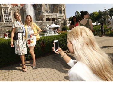 Reigning Miss World Canada 2018 Hanna Begovic (L) with Natalia Seneusen from Ajou, Quebec at the back garden at Casa Loma  on Wednesday July 24, 2019. Jack Boland/Toronto Sun/Postmedia Network
