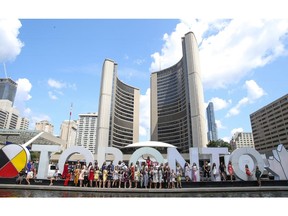 Miss World Canada 2019 delegates from coast-to-coast who will be vying for the crown this Saturday night. They posed in front of the Toronto sign at Nathan Phillips Square on Wednesday July 24, 2019. Jack Boland/Toronto Sun/Postmedia Network