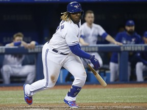 Toronto Blue Jays Vlad Guerrero Jr. 3B (27) hits a grounder for a double In the ninth inning in Toronto on Friday April 26, 2019.