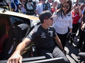 Injured driver Robert Wickens of Canada is photographed before leading the parade lap in a car fitted with hand controls before the 2019 Honda Indy Toronto race in Toronto, Sunday July 14, 2019.