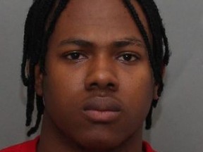 Yan Cedrick Mone, 21, of Toronto, faces numerous charges in connection with the gunpoint kidnapping and robbery of a U.S. tourist that occurred on monday, july 15, 2019. (Toronto Police handout)