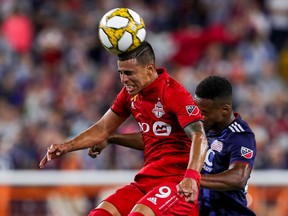 Toronto FC midfielder Erickson Gallardo heads the ball during Saturday's game against the New England Revolution. (USA TODAY SPORTS)