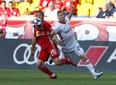 New York Red Bulls defender Race Buckmaster defends against Toronto FC midfielder Jacob Shaffelburg during Saturday's game. (USA TODAY SPORTS)