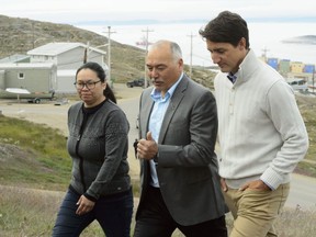 Prime Minister Justin with Nunavut Premier Joe Savikataaq and Iqaluit Mayor Madeleine Redfern in Iqaluit, Nunavut on Friday, Aug 2, 2019