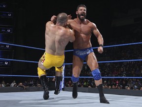 WWE Superstar Robert Roode clotheslines Mojo Rawley. (WWE Photo)