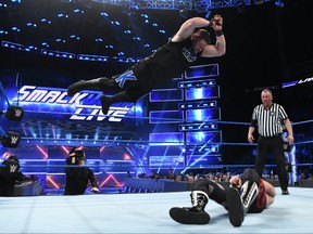 Kevin Owens executes a frogsplash on Sami Zayn during an episode of Smackdown Live. Owens will be facing Shane McMahon at Sunday's WWE SummerSlam event.