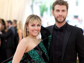 Miley Cyrus and Liam Hemsworth attend The 2019 Met Gala Celebrating Camp: Notes on Fashion at Metropolitan Museum of Art on May 06, 2019 in New York City.