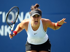 Bianca Andreescu reacts after winning a point against Kiki Bertens during a third round match on Day 6 of the Rogers Cup at Aviva Centre on August 8, 2019 in Toronto.  (Vaughn Ridley/Getty Images)