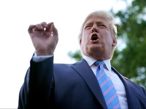 U.S. President Donald Trump talks to journalists before boarding Marine One and departing the White House August 2, 2019 in Washington, D.C. (Chip Somodevilla/Getty Images)