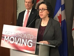 Transporation general manager Barbara Gray addresses the media on Dec. 20, 2016 as Mayor John Tory looks on. (Toronto Sun file photo)