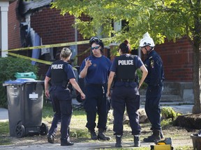 Mike Ross (second from left), of the Ontario Fire Marshal's office, is pictured at the scene of a Brampton home explosion on Aug. 13, 2019.