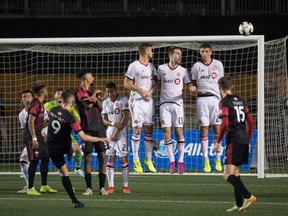 Toronto FC defenders block a shot from Ottawa Fury FC's Carl Haworth during last week's game. (USA TODAY SPORTS)
