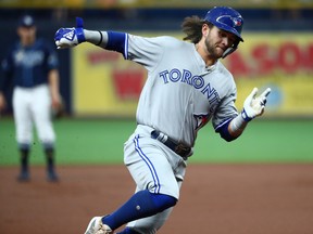 Toronto Blue Jays shortstop Bo Bichette runs home to score a run during the first inning against the Tampa Bay Rays at Tropicana Field. (Kim Klement-USA TODAY Sports)