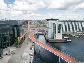 The 'Snake,' shown here in Copenhagen and  designed by Dissing + Weitling, is a source of inspiration for other bike skyways around the world.