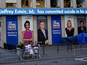 The Fox News electronic ticker at the News Corporation building shows the news about Jeffrey Epstein after he was found dead in his cell in the Manhattan Correctional Center of New York City, New York, U.S., August 10, 2019. (REUTERS/Eduardo Munoz)