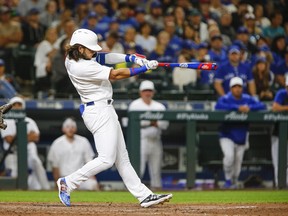 Blue Jays shortstop Bo Bichette strokes an RBI single in the seventh inning against the Seattle Mariners at T-Mobile Park on Saturday night. Lindsey Wasson/USA TODAY Sports