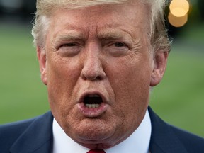 U.S. President Donald Trump speaks to the press at the White House as he departs for Cincinnati to hold a campaign rally in Washington, D.C, on August 1, 2019. (NICHOLAS KAMM/AFP/Getty Images)