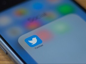 In this file photo taken on July 10, 2019 The Twitter logo is seen on a phone in this photo illustration in Washington, D.C, on July 10, 2019. (ALASTAIR PIKE/AFP/Getty Images)
