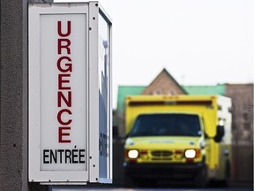 A Montreal emergency room with an ambulance in the background.