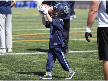 Darius raise carries a ball across the field at practice on Thursday August 29, 2019. Jack Boland/Toronto Sun/Postmedia Network