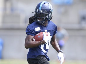 Toronto Argonauts DB  Abdul Kanneh whips around with the bar during a drill during practice at Lamport Stadium in Toronto, Ont.. Jack Boland/Toronto Sun/Postmedia Network