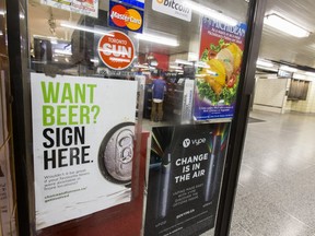 A sign encouraging a wider availability of beer, is seen at a kiosk at the Bloor-Yonge TTC Station in Toronto, Ont. on Tuesday, Aug. 27, 2019. (Ernest Doroszuk/Toronto Sun/Postmedia)