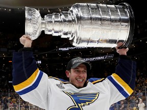 Jordan Binnington of the St. Louis Blues celebrates with the Stanley Cup after defeating the Boston Bruins at TD Garden on June 12, 2019 in Boston. (Bruce Bennett/Getty Images)