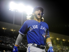 Blue Jays’ Bo Bichette celebrates under the lights after hitting a solo home run against the Dodgers during the sixth inning 
on Wednesday night at Dodger Stadium. Bichette finished with a pair of homers, both off Clayton Kershaw. (USA TODAY SPORTS PHOTO)