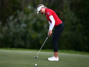 Brooke Henderson putts on the 8th green during the second round of the CP Women's Open at Magna Golf Club in Aurora, Ont., on Friday, Aug. 23, 2019.